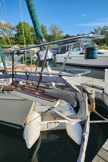 Tilikum III Yacht Photos Pics 1997 Island Packet 40 sailboat docked, featuring bow and anchor details.