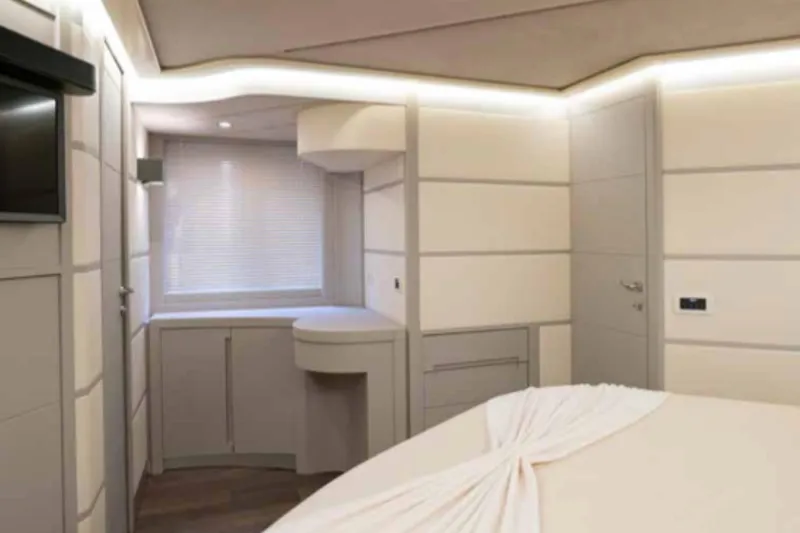  Yacht Photos Pics Luxurious interior of a 2005 Pershing 62 yacht with modern design and ambient lighting.