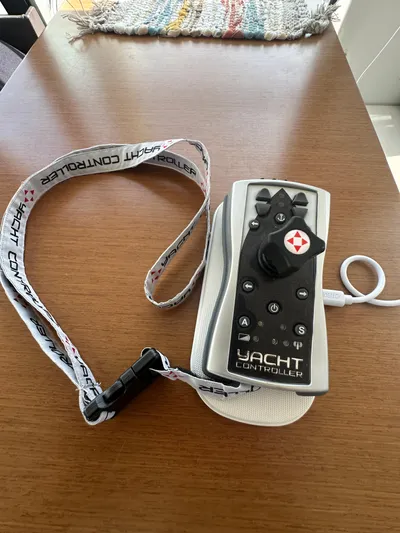 "freedom" Yacht Photos Pics Yacht controller on wooden table, Jeanneau NC 14, 2016 model.