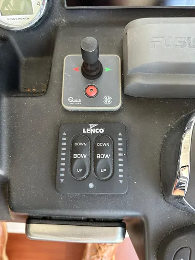 "freedom" Yacht Photos Pics Control panel of a 2016 Jeanneau NC 14 boat with Lenco trim tab controls.