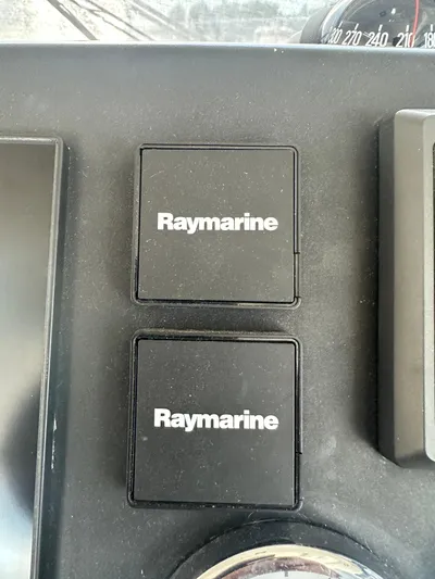 "freedom" Yacht Photos Pics Raymarine controls on 2016 Jeanneau NC 14 boat dashboard.