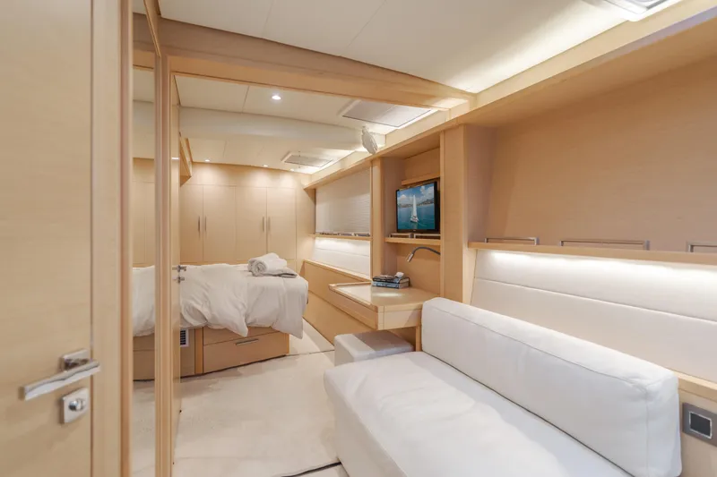 Sunset O Yacht Photos Pics Luxurious interior of 2019 Lagoon 620 yacht with modern furnishings and cozy bedroom.