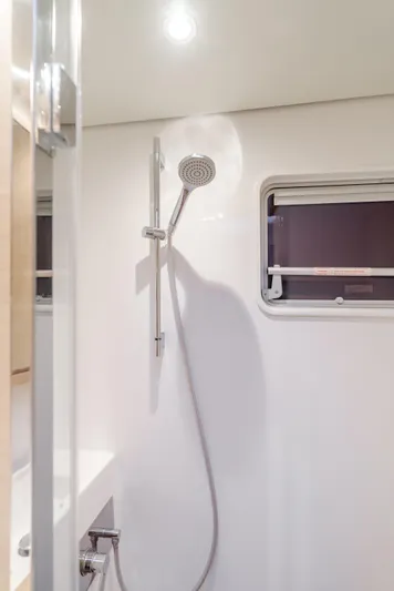 Sunset O Yacht Photos Pics Modern shower area in a 2019 Lagoon 620 yacht bathroom.