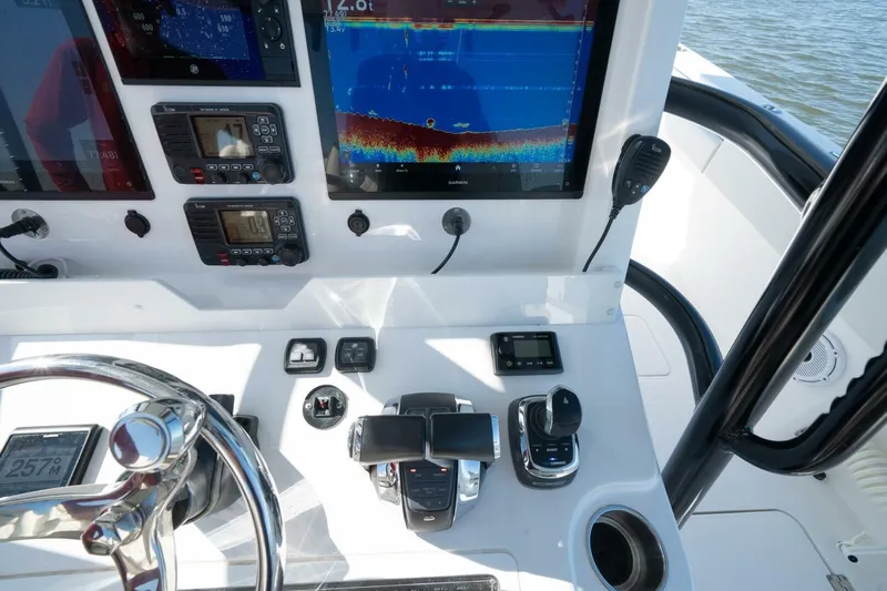  Yacht Photos Pics 2021 Invincible 35 Catamaran dashboard with advanced navigation and control systems.