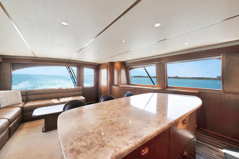 Cutter Bill Yacht Photos Pics Luxurious interior of 2011 Viking 70 Convertible yacht with ocean view.