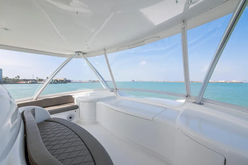 Cutter Bill Yacht Photos Pics Luxurious interior of 2011 Viking 70 Convertible yacht with ocean view.