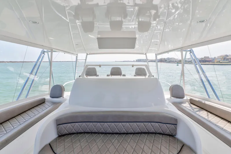 Cutter Bill Yacht Photos Pics Luxurious interior of 2011 Viking 70 Convertible yacht with ocean view.