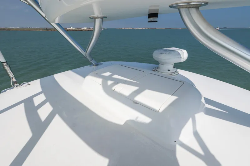 Cutter Bill Yacht Photos Pics 2011 Viking 70 Convertible yacht deck with ocean view and sleek design.