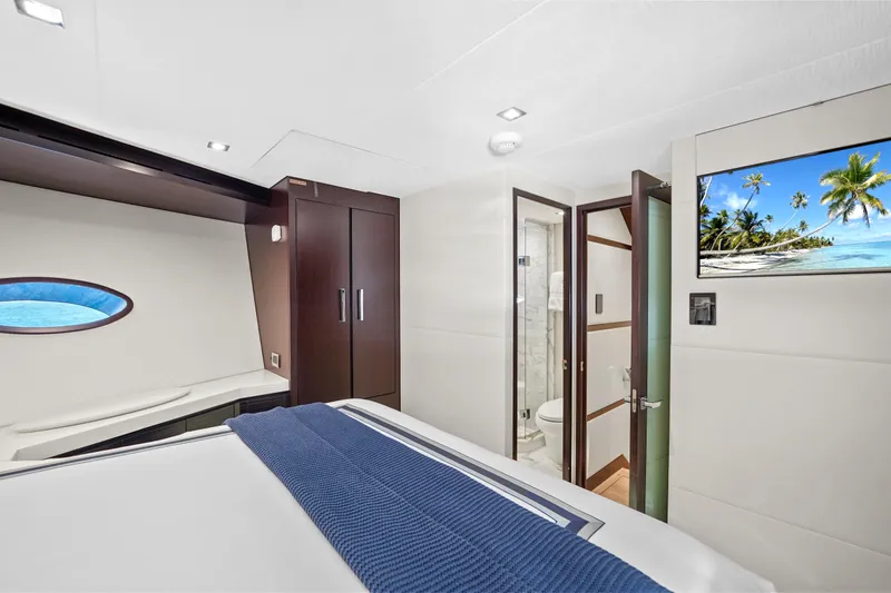 Surplus Lines Yacht Photos Pics Luxurious cabin interior of 2019 Hatteras M90 Panacera yacht with modern amenities.