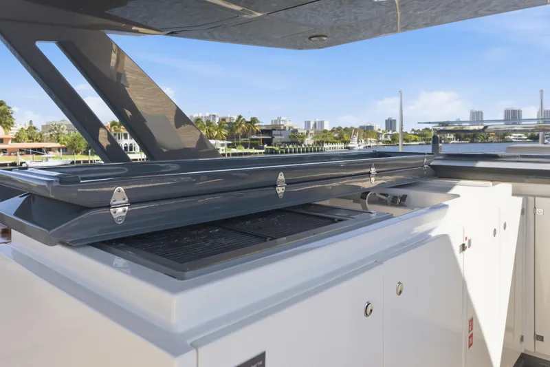 Date Night Yacht Photos Pics Outdoor kitchen on 2018 Ferretti Yachts 920, featuring sleek design and waterfront view.