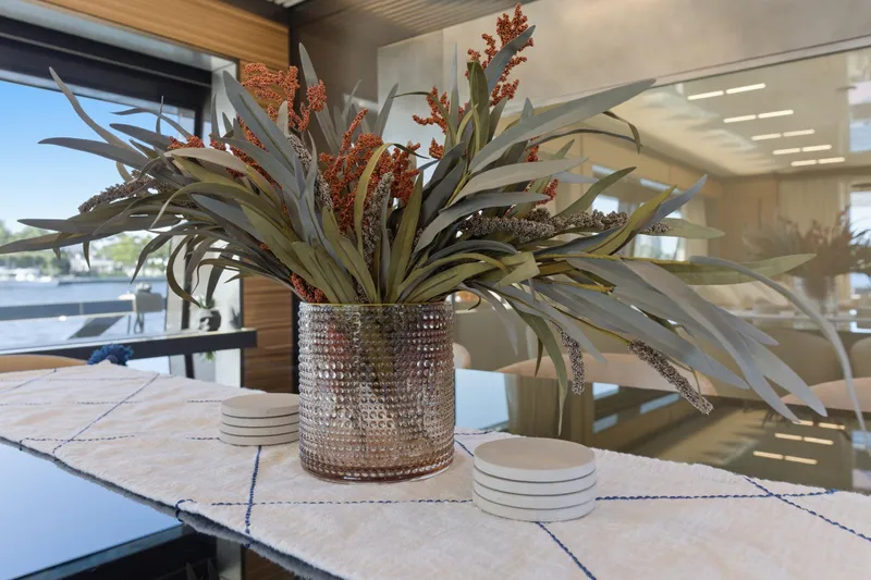 Date Night Yacht Photos Pics Decorative plant arrangement on Ferretti Yachts 920, 2018 model, elegant interior design.