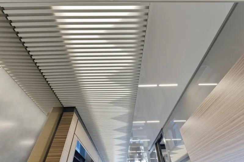 Date Night Yacht Photos Pics Modern interior ceiling design of 2018 Ferretti Yachts 920, featuring sleek lines and lighting.