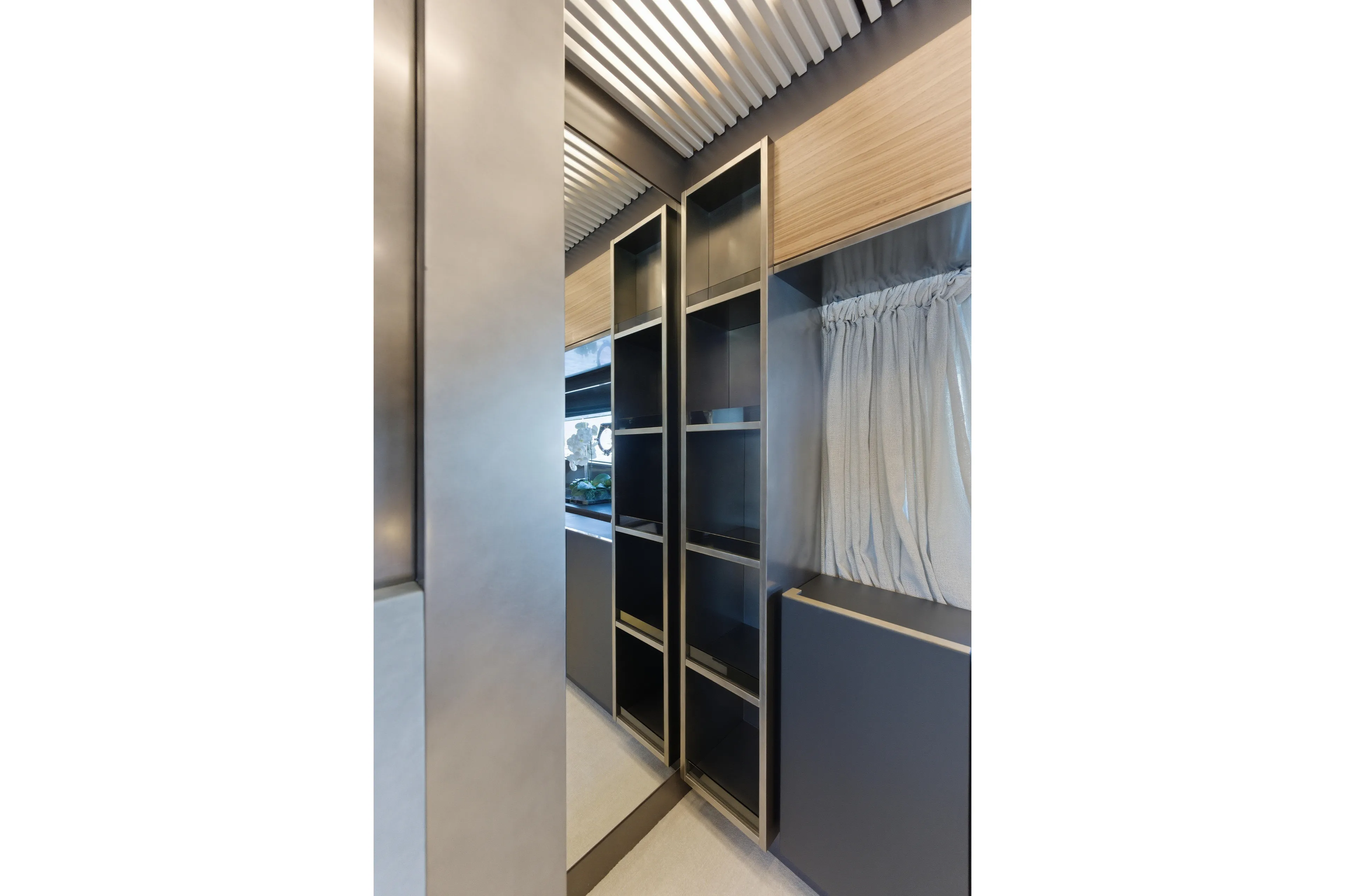 Date Night Yacht Photos Pics Modern interior of 2018 Ferretti Yachts 920 with sleek shelving and window curtains.