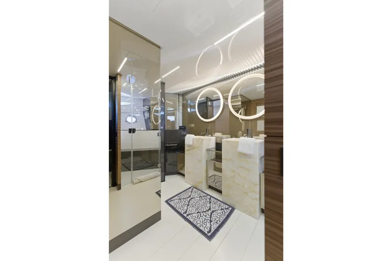 Date Night Yacht Photos Pics Luxurious bathroom interior of 2018 Ferretti Yachts 920 with modern design elements.