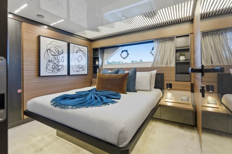 Date Night Yacht Photos Pics Luxurious bedroom interior of 2018 Ferretti Yachts 920, featuring modern decor and elegant design.