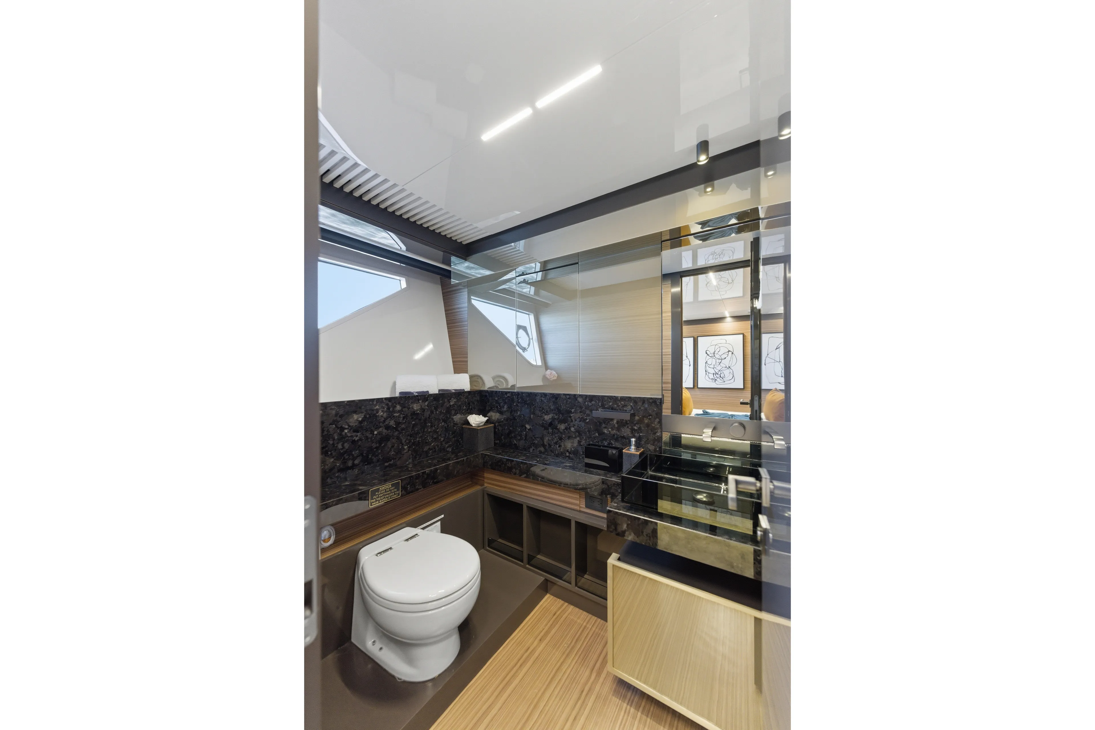 Date Night Yacht Photos Pics Luxurious bathroom interior of 2018 Ferretti Yachts 920 with modern fixtures and elegant design.