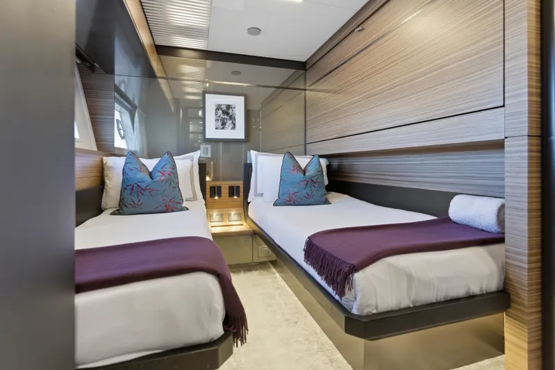 Date Night Yacht Photos Pics Luxurious twin cabin interior on 2018 Ferretti Yachts 920, featuring modern design and cozy bedding.