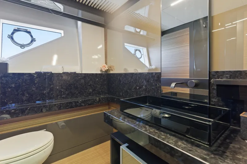 Date Night Yacht Photos Pics Luxurious bathroom interior of 2018 Ferretti Yachts 920 with modern fixtures and elegant design.