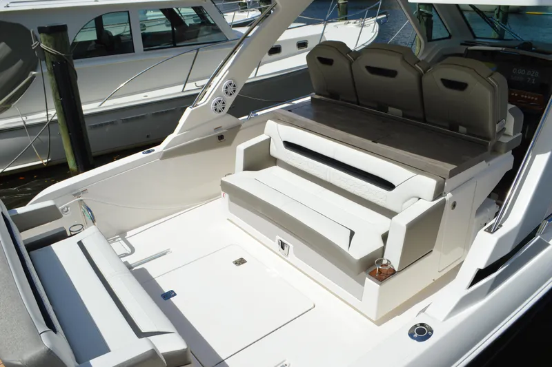 Station Break Yacht Photos Pics 2024 Tiara Yachts 34 LS interior with luxurious seating and modern design.