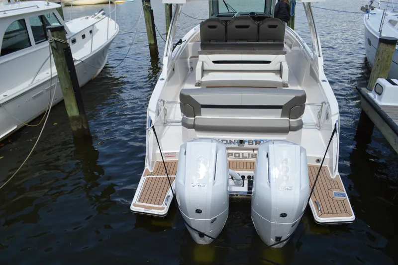 Station Break Yacht Photos Pics 2024 Tiara Yachts 34 LS with dual engines docked at marina.