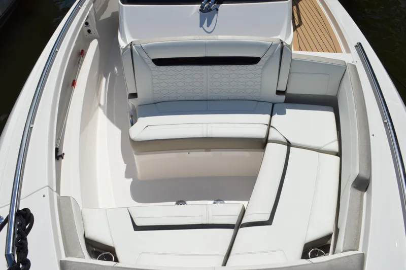 Station Break Yacht Photos Pics 2024 Tiara Yachts 34 LS boat interior with luxurious white seating arrangement.