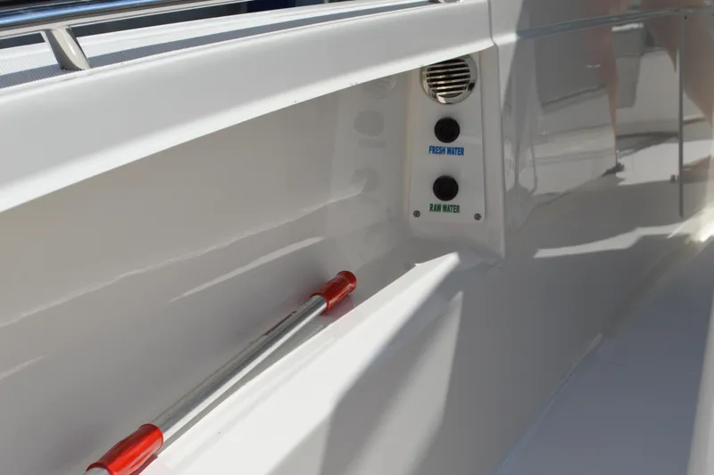 Station Break Yacht Photos Pics 2024 Tiara Yachts 34 LS boat interior with fresh and raw water controls.