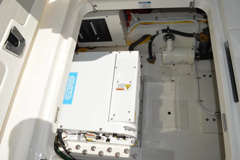 Station Break Yacht Photos Pics 2024 Tiara Yachts 34 LS engine compartment showcasing electrical and mechanical components.