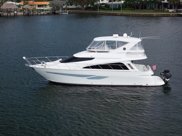 Water Break Yacht Photos Pics 2008 Marquis 50 LS yacht cruising on calm waters, showcasing sleek design and luxury features.