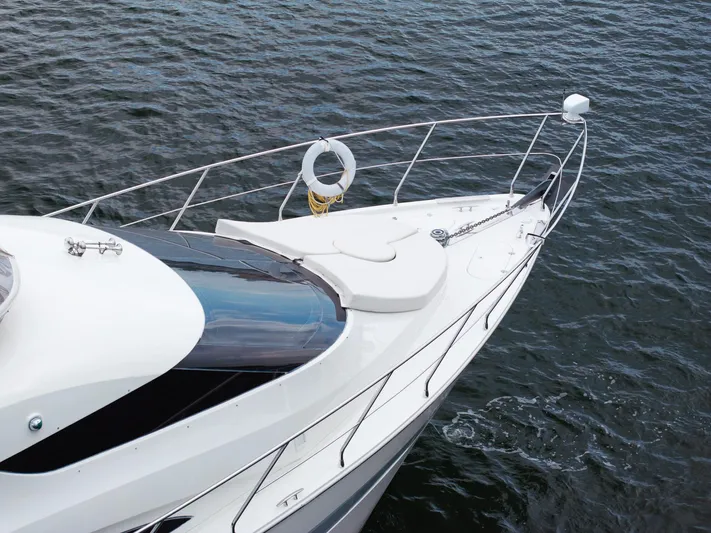 Water Break Yacht Photos Pics 2008 Marquis 50 LS yacht on water, showcasing sleek design and luxury features.