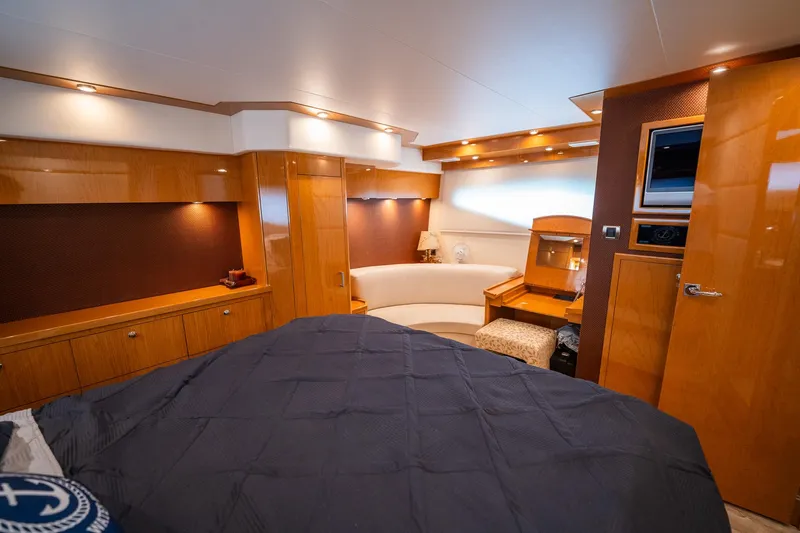 Water Break Yacht Photos Pics Luxurious interior of a 2008 Marquis 50 LS yacht with elegant wood finishes.