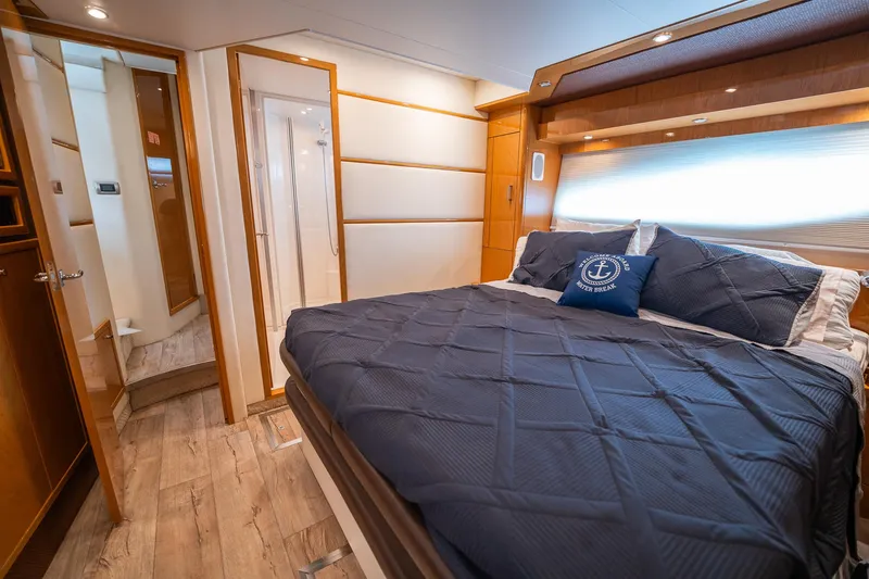 Water Break Yacht Photos Pics Luxurious bedroom interior of 2008 Marquis 50 LS yacht with modern design.