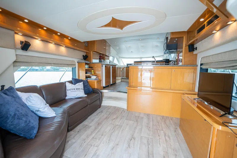 Water Break Yacht Photos Pics Luxurious interior of a 2008 Marquis 50 LS yacht with modern furnishings and elegant design.