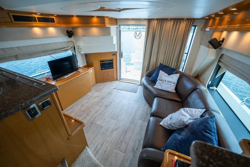 Water Break Yacht Photos Pics Luxurious interior of 2008 Marquis 50 LS yacht with leather seating and modern amenities.