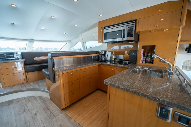 Water Break Yacht Photos Pics Luxurious kitchen interior of 2008 Marquis 50 LS yacht with modern appliances.