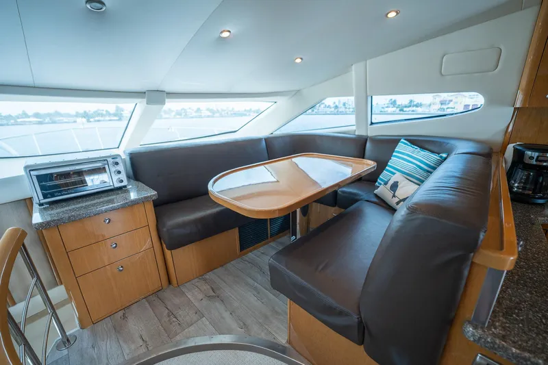 Water Break Yacht Photos Pics Interior of 2008 Marquis 50 LS yacht with cozy seating and modern amenities.