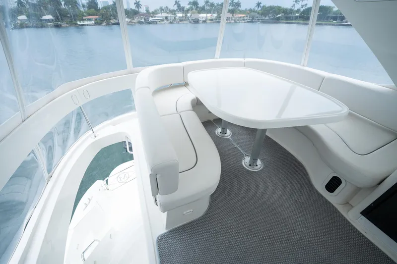 Water Break Yacht Photos Pics Luxurious seating area on a 2008 Marquis 50 LS yacht with waterfront view.