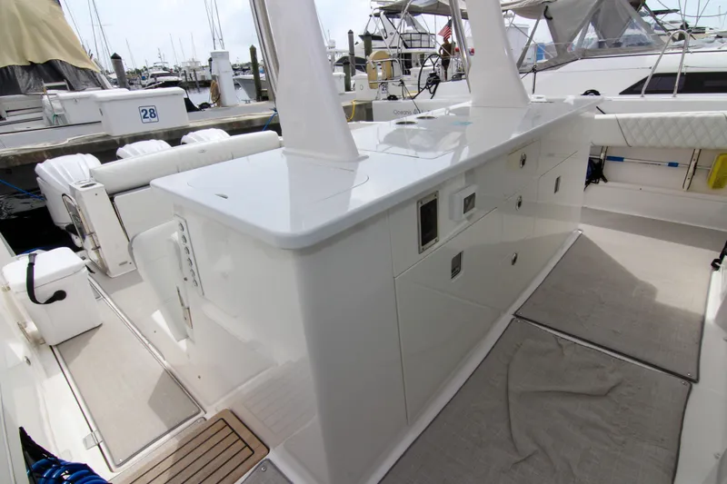 Yacht Photos Pics 2023 Regal 38 SAV boat interior with sleek white cabinetry and modern design.