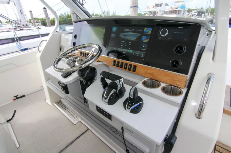  Yacht Photos Pics 2023 Regal 38 SAV helm with modern controls and navigation display.