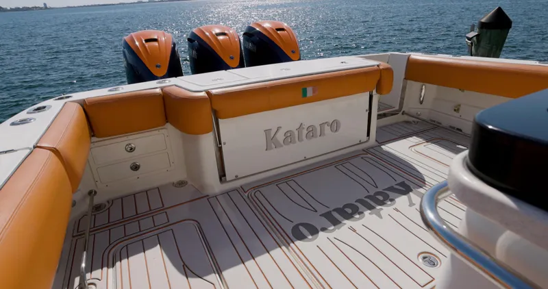  Yacht Photos Pics 2009 Hydra-Sports 4200 SF boat deck with triple engines, orange seating, and ocean view.