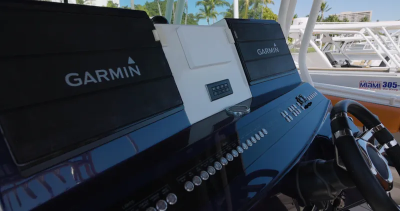  Yacht Photos Pics 2009 Hydra-Sports 4200 SF boat dashboard with Garmin navigation systems.