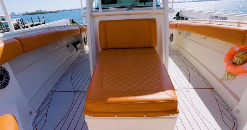  Yacht Photos Pics 2009 Hydra-Sports 4200 SF boat interior with orange seating and ocean view.