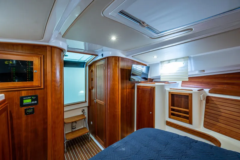  Yacht Photos Pics 2020 Back Cove 340 cabin interior with wood paneling and modern amenities.