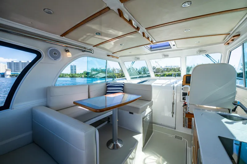  Yacht Photos Pics Interior of 2020 Back Cove 340 boat with modern seating and panoramic windows.