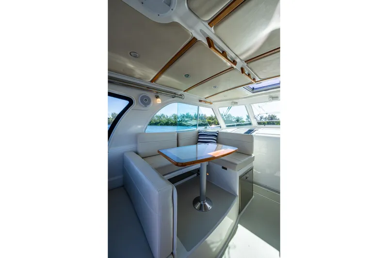  Yacht Photos Pics Interior of 2020 Back Cove 340 yacht with elegant seating and table.