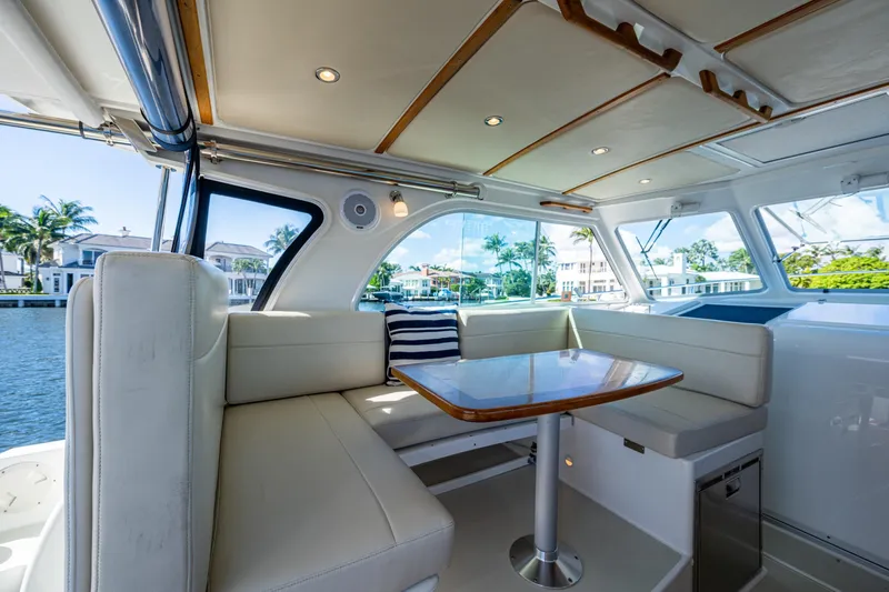  Yacht Photos Pics Interior of 2020 Back Cove 340 yacht with elegant seating and waterfront view.
