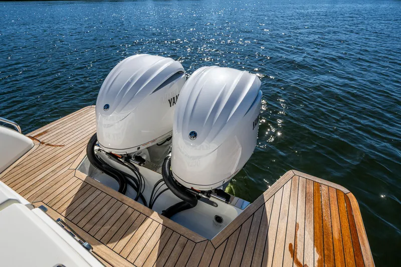  Yacht Photos Pics 2020 Back Cove 340 boat with twin Yamaha outboard engines on wooden deck.