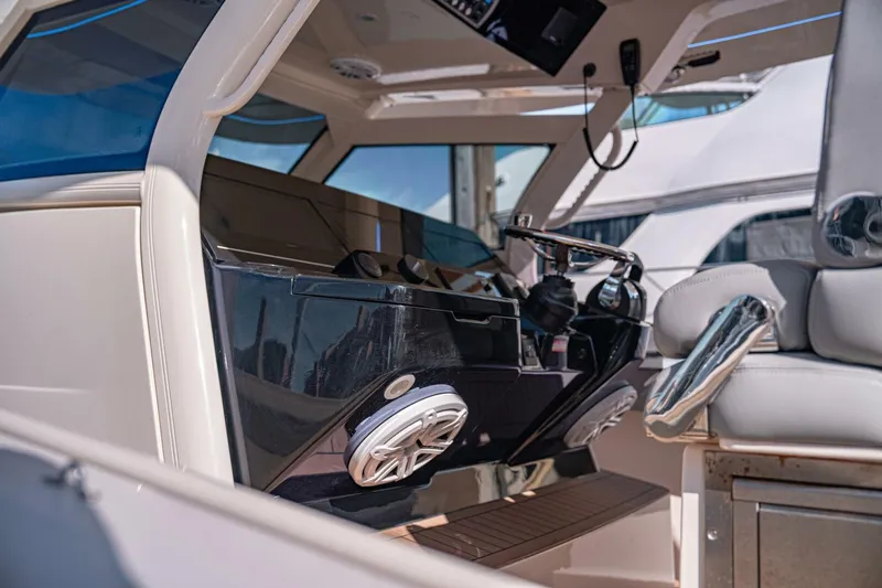 O-sea-d Yacht Photos Pics 2020 Scout 380 LXF boat interior with modern helm and luxurious seating.