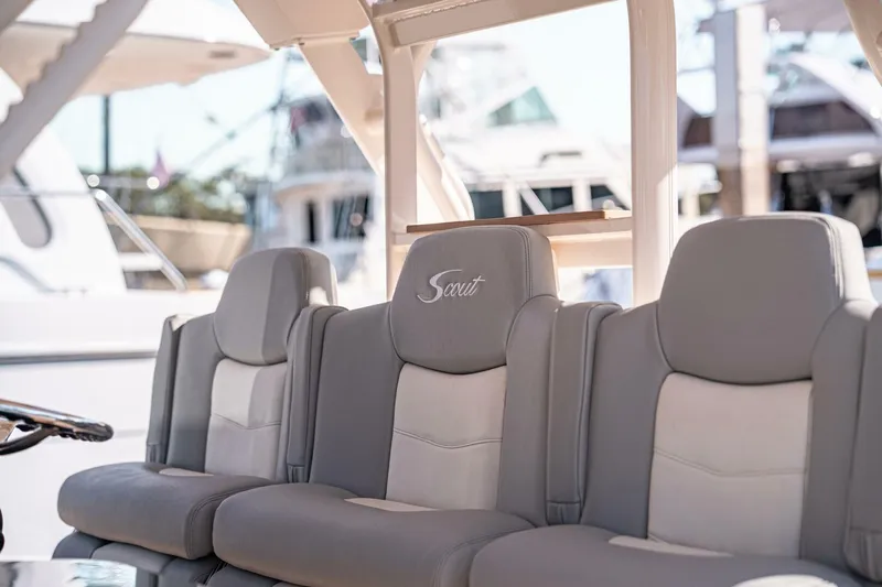 O-sea-d Yacht Photos Pics 2020 Scout 380 LXF boat seats with embroidered logo, docked in marina.