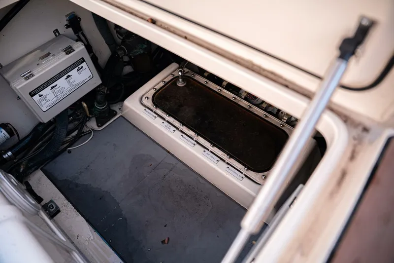 O-sea-d Yacht Photos Pics 2020 Scout 380 LXF boat compartment with electrical components and wiring.