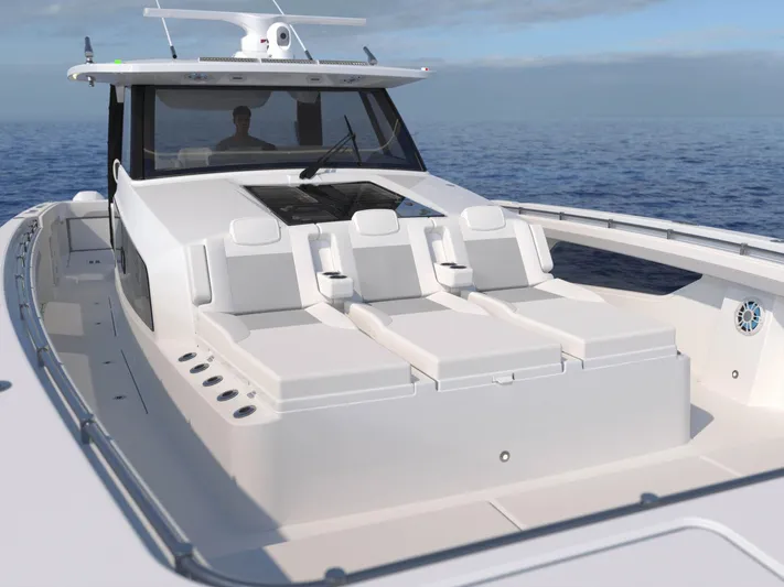 Aquila Molokai 47 Yacht Photos Pics 2026 Aquila 47 Molokai yacht with spacious deck and seating, cruising on open water.